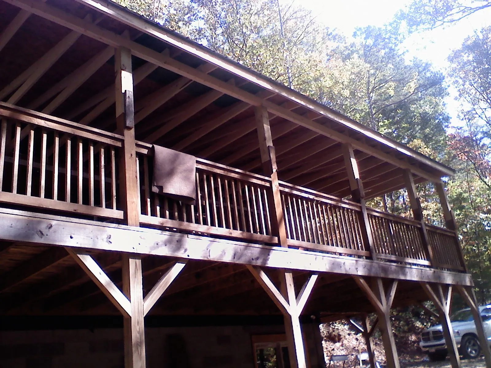 Timber framing under a new elevated porch and deck — Roof Leak Repair in West Point by Roofing Brothers